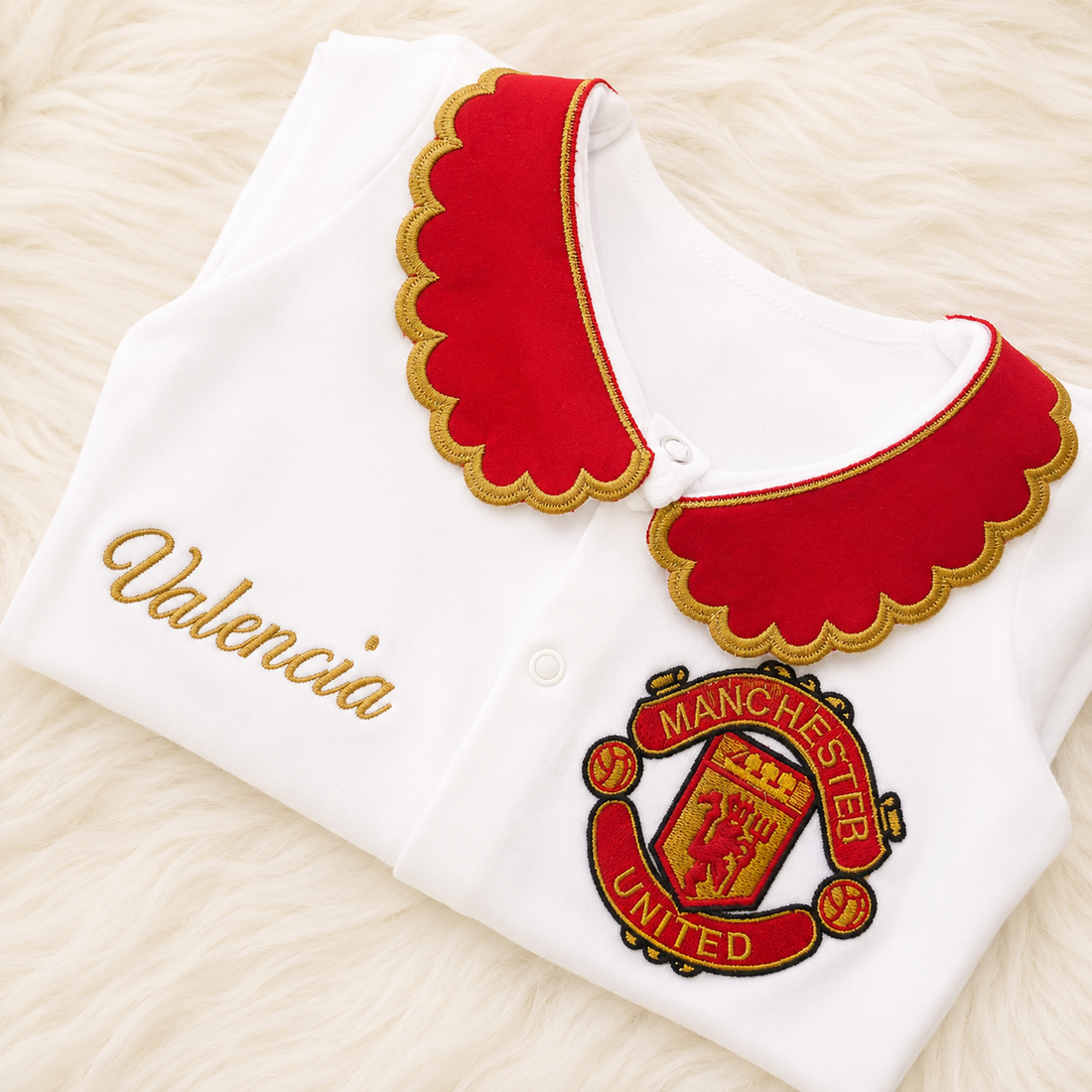 Traje de bebé del Manchester