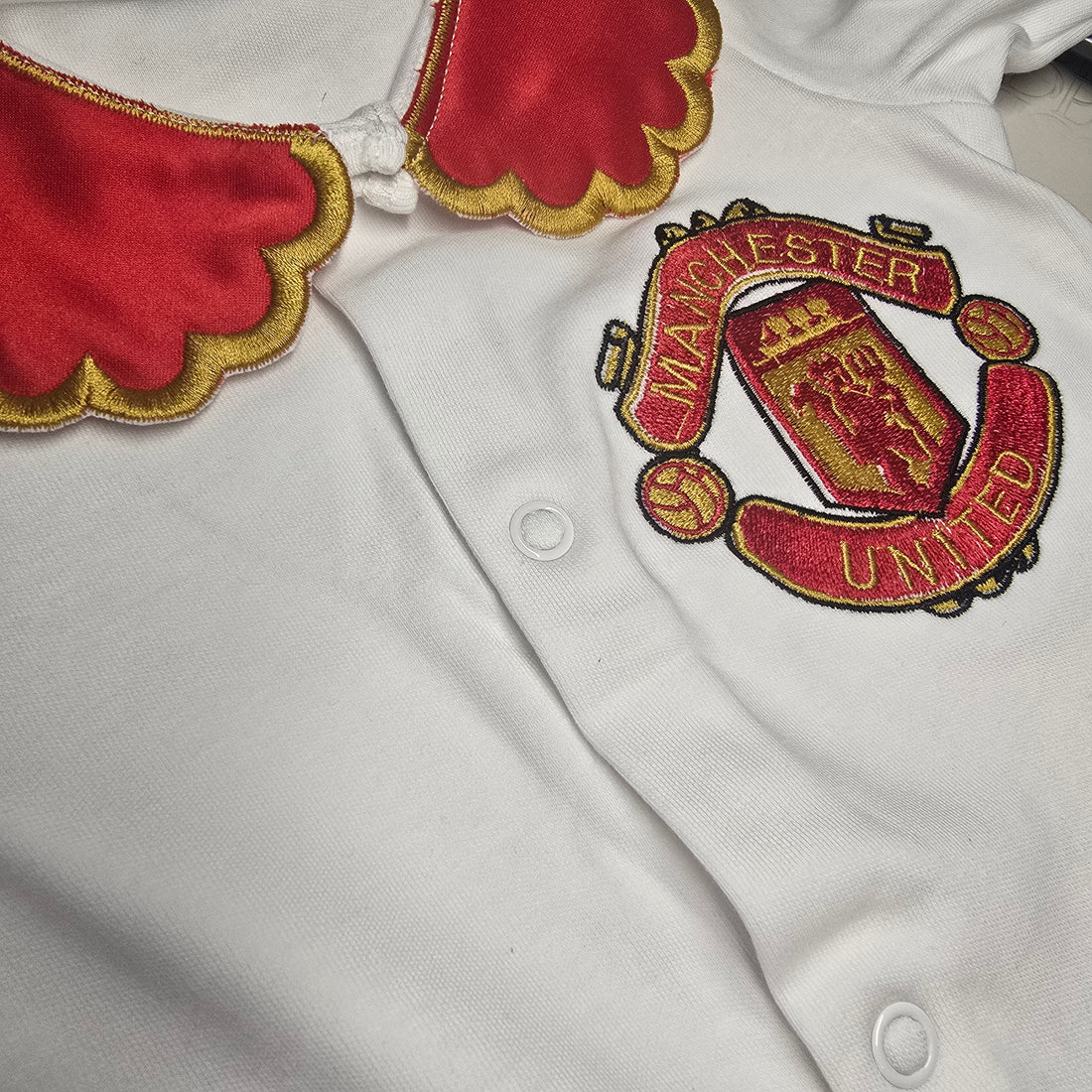 Manchester Baby Grow