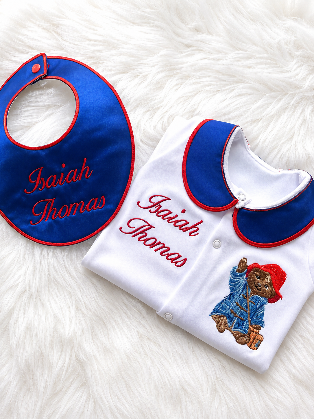 Personalised Paddington bib and baby grow set with blue and red embroidered details