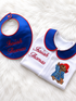 Personalised Paddington bib and baby grow set with blue and red embroidered details