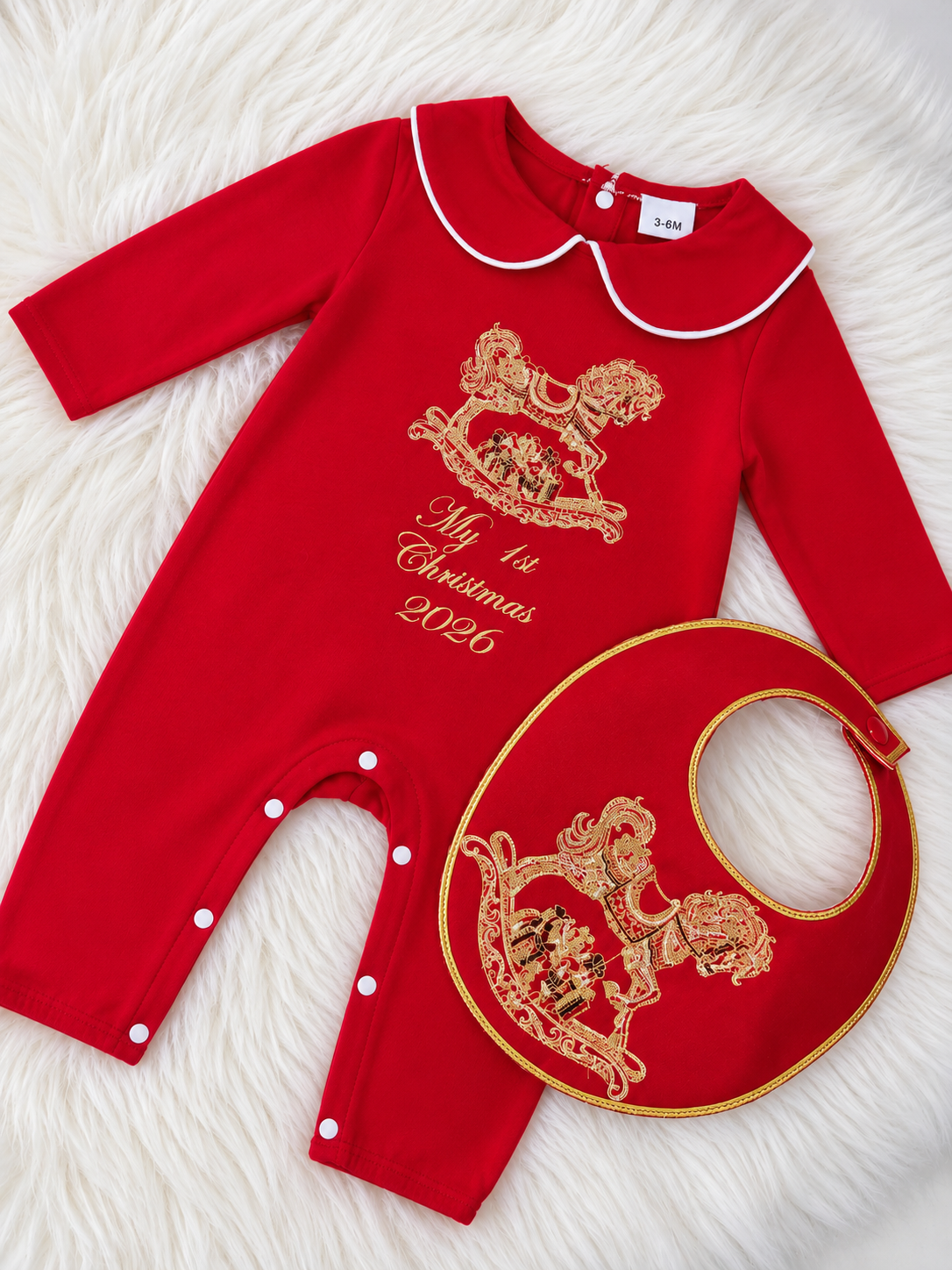 Personalised red Christmas rocking horse baby grow and matching bib with gold embroidery