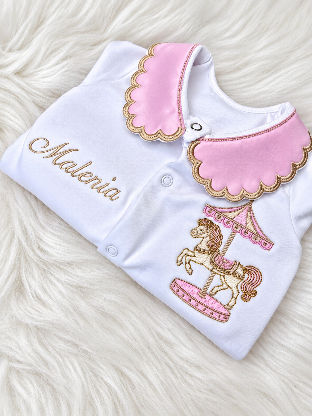 Personalised pink and white baby romper with scalloped collar and carousel horse embroidery