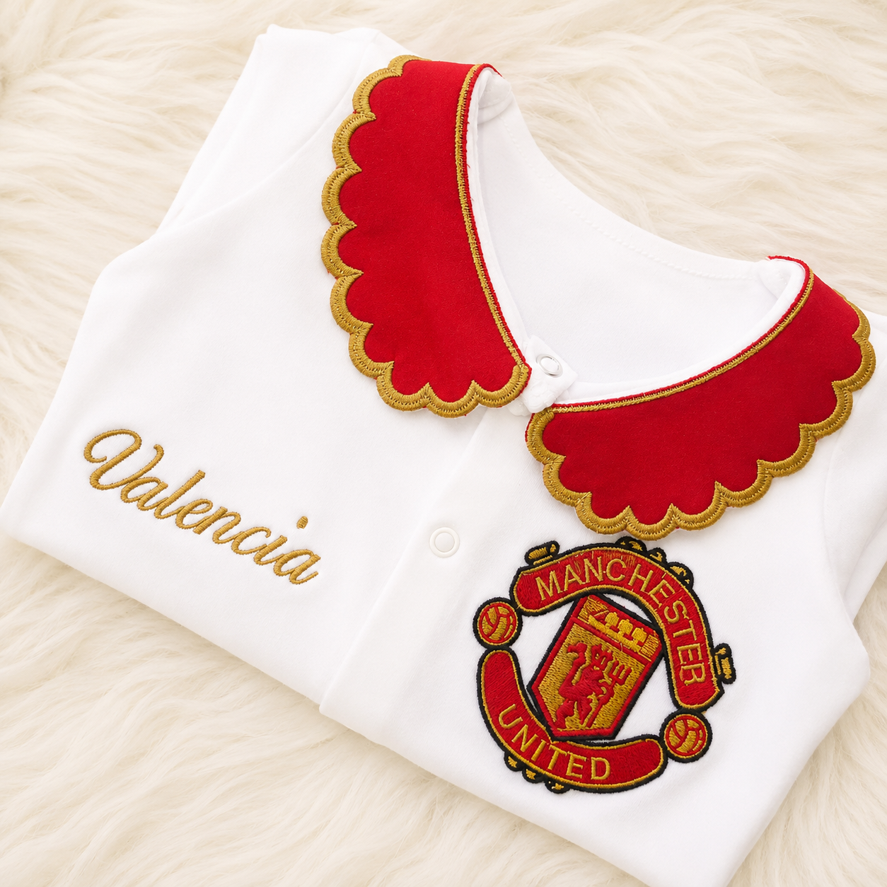 Traje de bebé del Manchester
