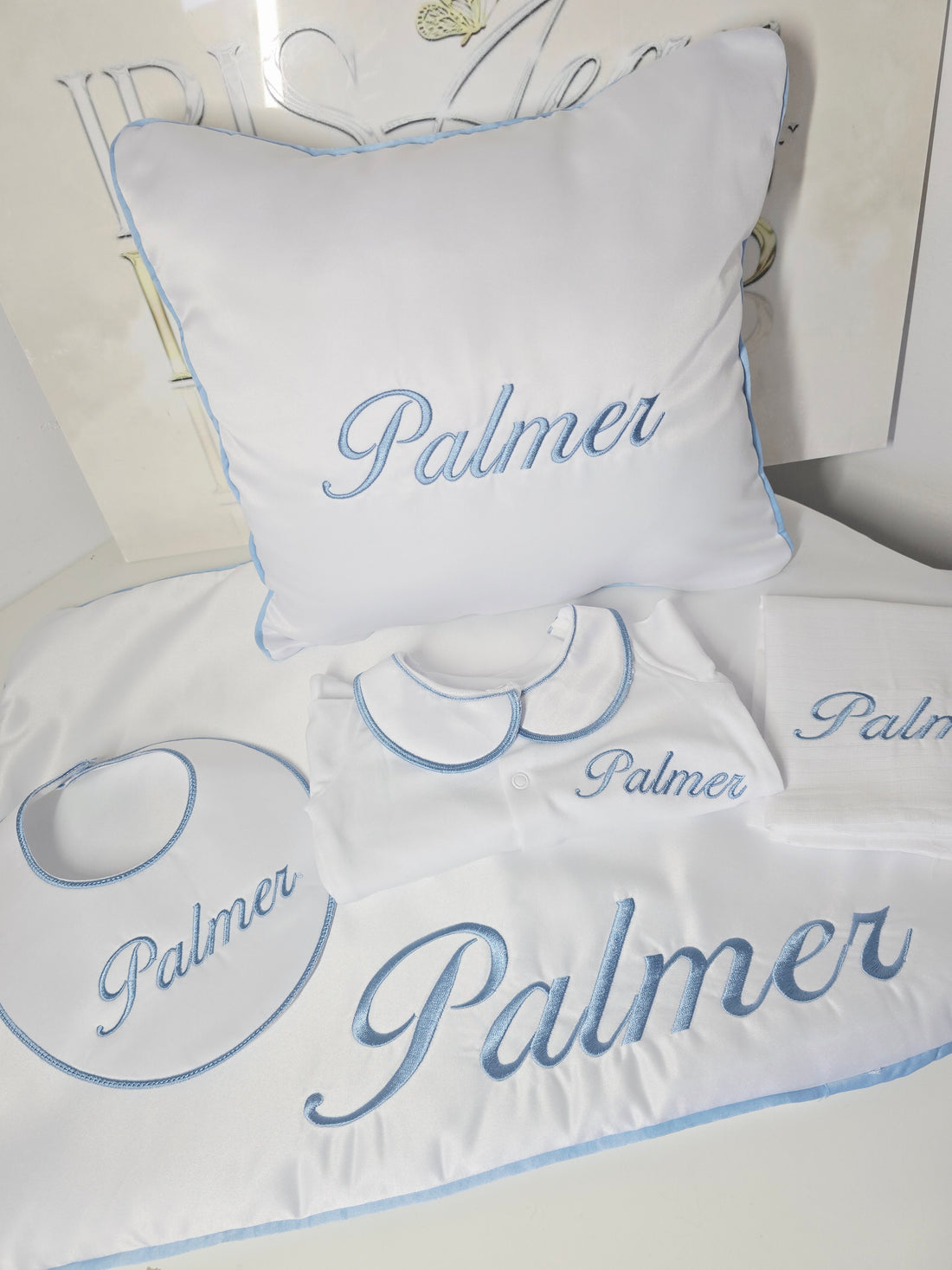 Light Blue Piped Set - Bib, Grow, Muslin, Cushion and Small Satin Blanket